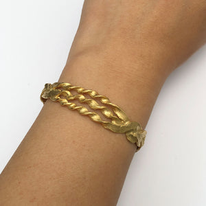 Brazalete Trenza Chapa de Oro